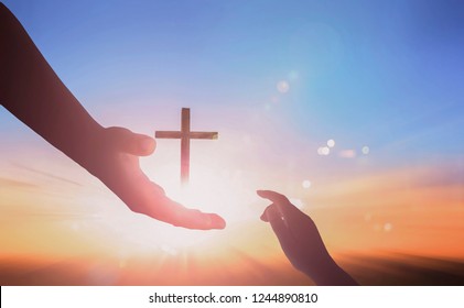 Jesus helping hand concept: World Peace Day Help hand on sunset background