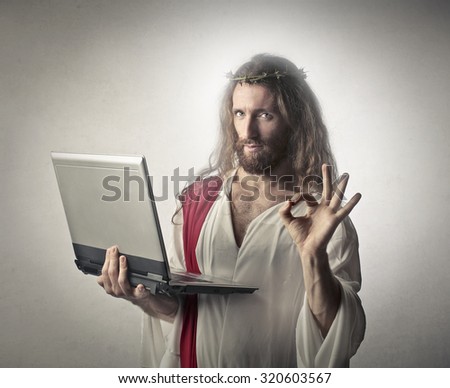 Jesus holding a pc