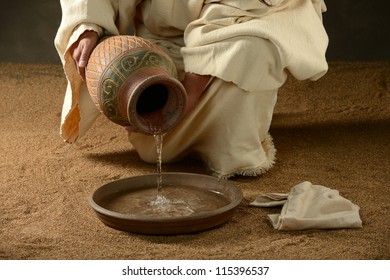 Jesus with a jug of water and a towel on a neutral background