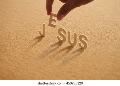 Jesus letters wooden on cork board background