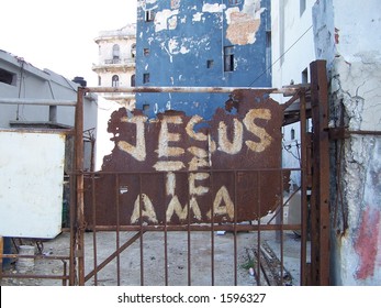"Jesus loves you" - writing on the entrance to a poor building of Havana city. Cuba