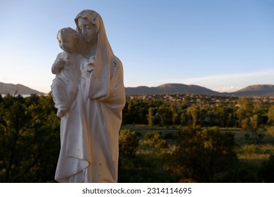Jesus and Mary at a scenic outlook - Shutterstock ID 2314114695
