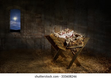 Jesus resting on a manger while light from the star filters into the room - Shutterstock ID 333608246