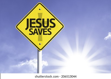 Jesus Saves road sign with sun background