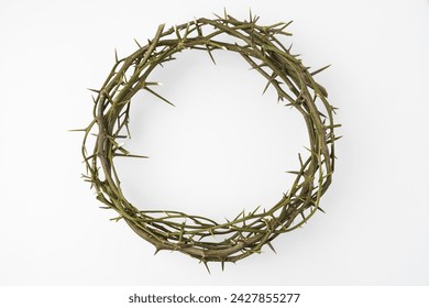 Jesus Wooden Crown of Thorns used by Catholic Christians on Good Friday Ceremony. Isolated on white background with empty blank copy text space.