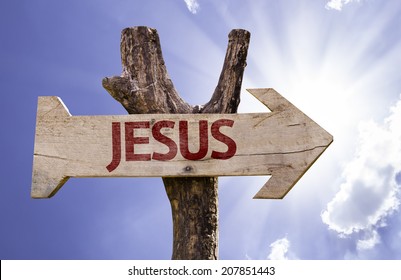 Jesus wooden sign on a beautiful day