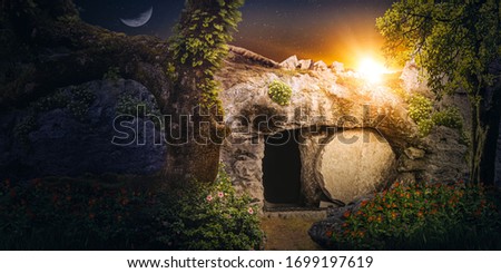 Jesus's empty tomb at sunrise. Concept of resurrection.