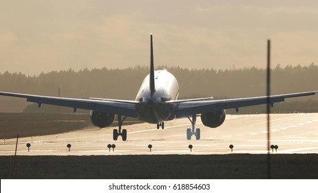 Jet Airliner Sunset Touchdown