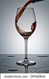 Jet Filling A Glass Of Wine , Studio Product Photography .