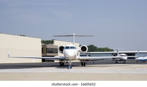 A Jet Outside A Hanger At A Regional Airport