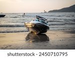 Jet Ski on the beach at sunset