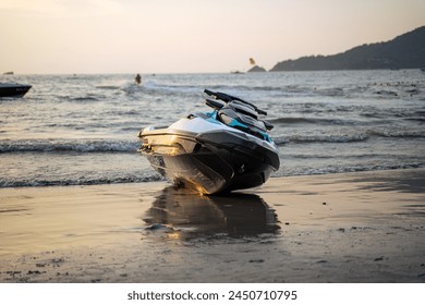 Jet Ski on the beach at sunset