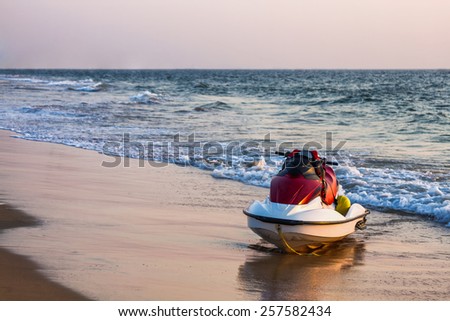 Jet ski on sea or ocean sand beach coast or shore