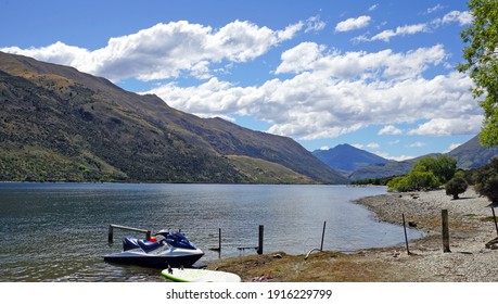 Jet Ski And Paddle Board At Wanaka Lake Shore