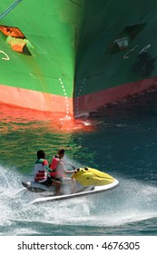 Jet Ski Racing In Front Of The Ship