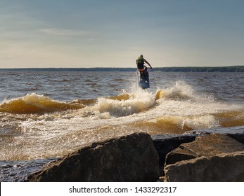 A Jet Skier performs an air Leap in Sylvan Beach, Oneida Lake, New York