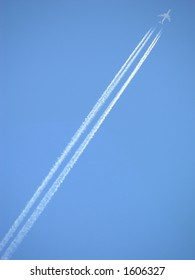 Jet Stream Against The Deep Blue Sky