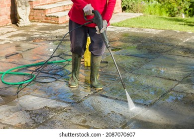 Jet Washing, Pressure Washing Or Cleaning A Garden Patio With A Jet Wash, UK 