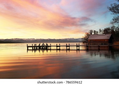 Jetty and boathouse at Lake Starnberg                               