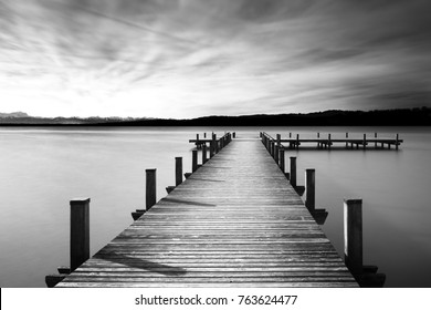 Jetty at lake Starnberger See in Bavaria, Germany, black and white