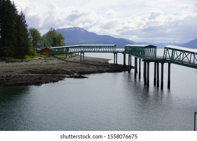 Jetty over calm waters Icy Point Straight Alaska - Powered by Shutterstock