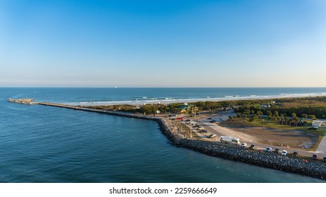Jetty Park at Port Canaveral. Jetty Park, beautiful 35 acre park with a fishing pier, beach and RV campground. Cape Canaveral on Space Coast near Cocoa Beach.