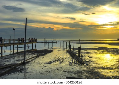 Jetty with sunset background