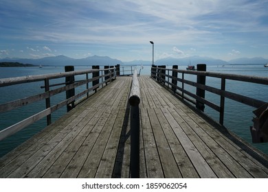 A Jetty Walk On Background If A Sunny Lake