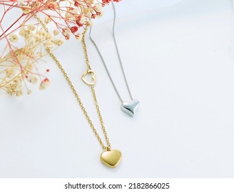 Jewelery background. Gold necklaces on background
