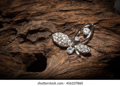 Jewelery Brooch On Wooden