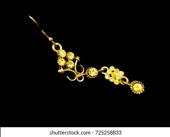 Jewellery- Golden Maang Tikka Isolated On Black Background