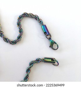 Jewelry Clasp Fastener On A Rolo Style Rainbow Oil Slick Chain Necklace