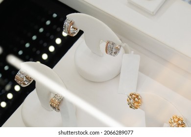 Jewelry Diamond Earrings Show In Luxury Retail Store Window Display Showcase