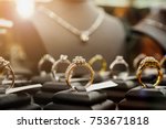 Jewelry diamond rings and necklaces show in luxury retail store window display showcase