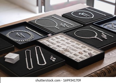 Jewelry Diamond Rings And Necklaces Show In Luxury Retail Store Display Showcase