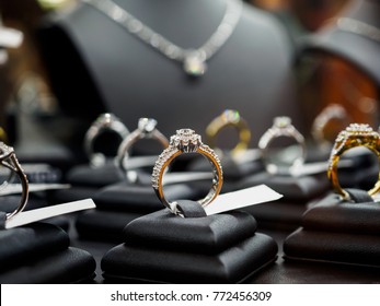 Jewelry Diamond Rings And Necklaces Show In Luxury Retail Store Window Display Showcase