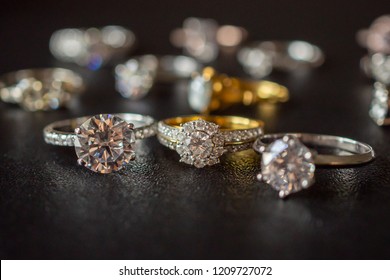 Jewelry Diamond Rings Set On Black Background Close Up