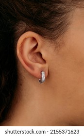 Jewelry, earrings in a beautiful girl's ear, women's accessories, gold earrings, earrings with stones, special diamonds - Shutterstock ID 2155371623