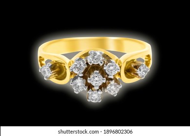 
Jewelry Gold Ring With Stones On A Black Background