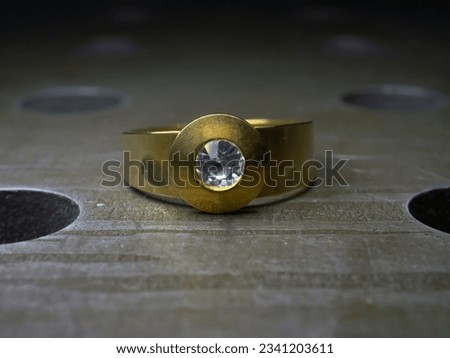 jewelry imitation gold with precious stones and engraving