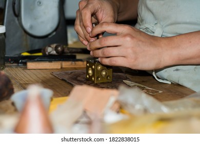 Jewelry Maker Woman Working In Professional Jewelry Workshop At Her Workbench.