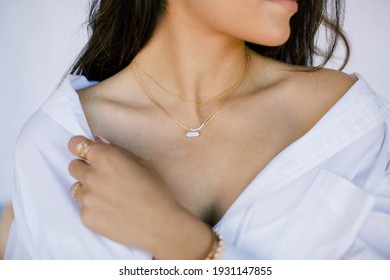 Jewelry Model photographed with dainty jewelry  