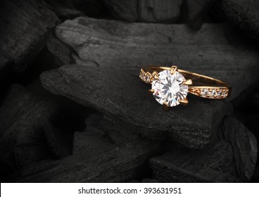 Jewelry Ring Witht Big Diamond On Dark Coal Background