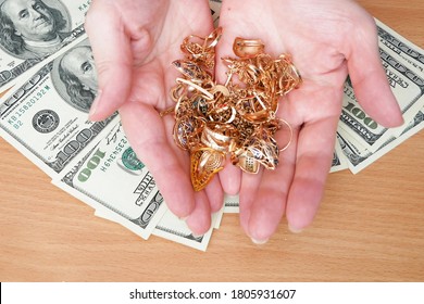 jewelry scrap of gold and silver and money, pawnshop concept, jewerly inspect and verify