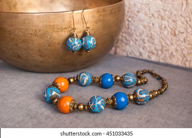 Jewelry set in oriental style. Bohemian necklace beads and earrings. Handmade jewellery of polymer clay.