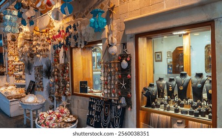 a jewelry shop, adorned with sea-themed decorations and a variety of seashells, elegantly complementing the refined selection of jewelry, creating a sophisticated maritime shopping experience - Powered by Shutterstock