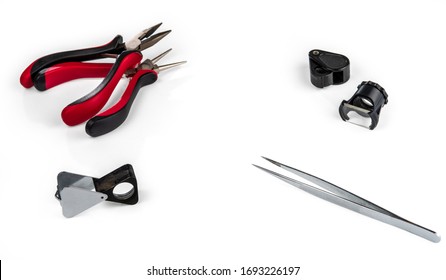 Jewelry Tools Isolated On White Background. A Set Of Tools For The Jeweler's Work. Selective Focus.  