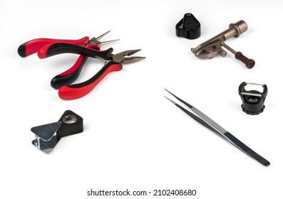 Jewelry Tools Isolated On White Background. A Set Of Tools For The Jeweler's Work. Selective Focus.  