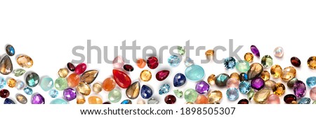 jewels as background. Jewelery texture. . Necklace earrings bracelet pearls gemstones as background