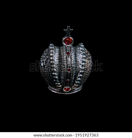 Jewerly crown with rubies closeup